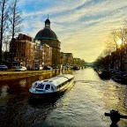 Amsterdam: Bicycles Rule, Pedestrians Pray, and Canal Boats Glide